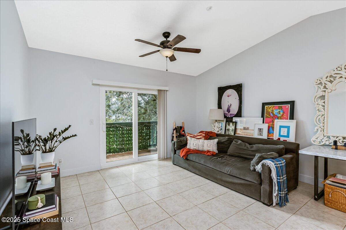 7667 North Wickham Road, Unit 118 Melbourne, FL 32940 - Photo 6 of 23 a living room with furniture