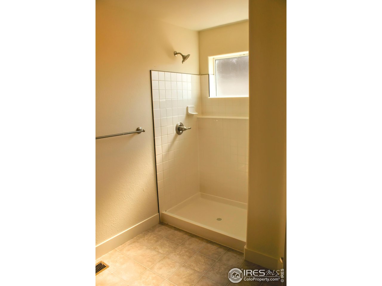 434 Luminous Drive Windsor, CO 80550 - Photo 13 of 29 a bathroom with a shower