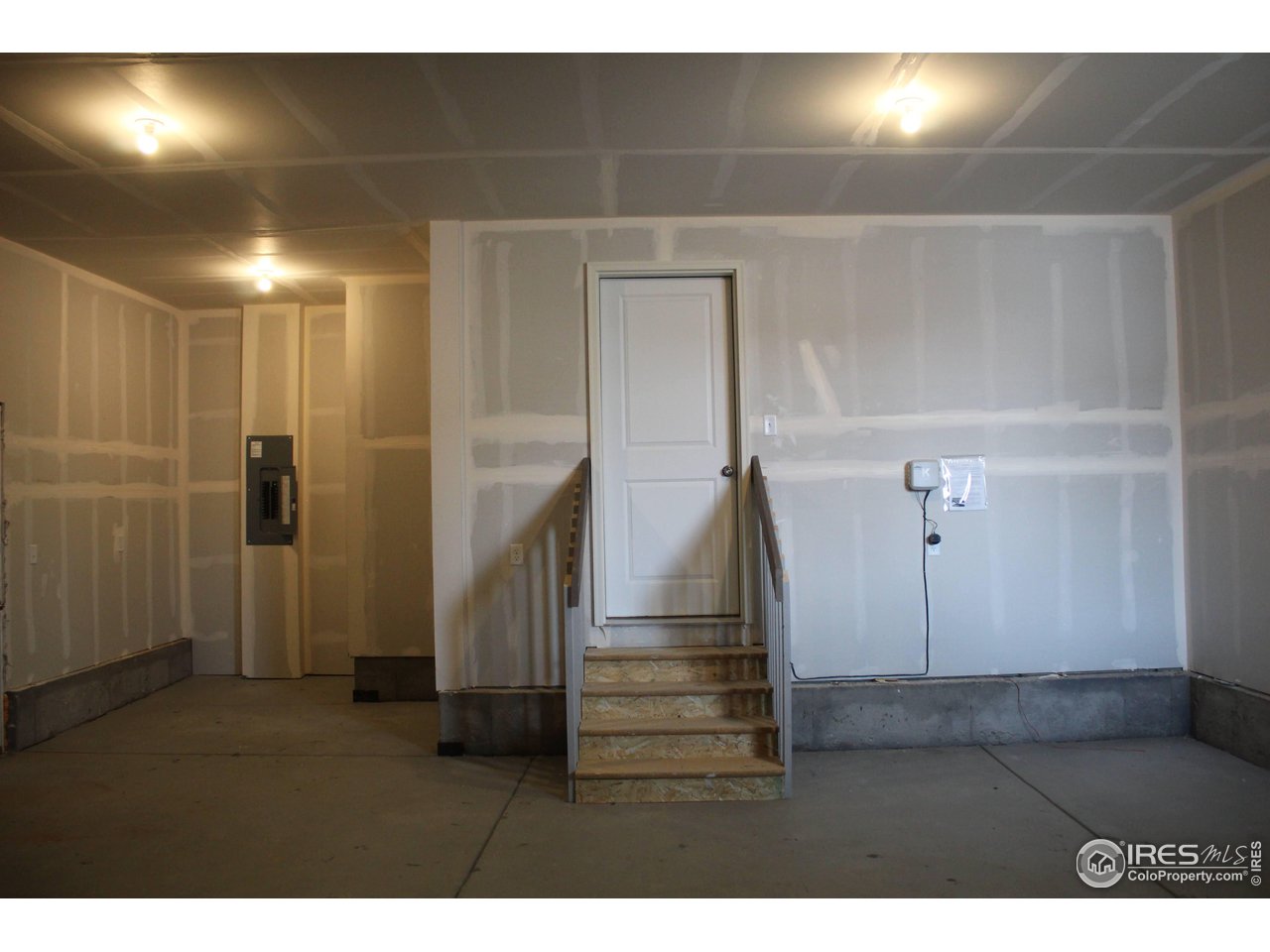 434 Luminous Drive Windsor, CO 80550 - Photo 26 of 29 a view of entryway with wooden floor