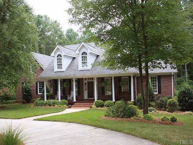 13917 Possum Track Road Raleigh, NC 27614 - Photo 1 of 12 Sited on 2.3 acres yet only 4 quick miles to I-540, shops, schools and churches! It is 3 sides brick and hardiplank. Circular drive too! Custom built with many thoughtful features you do not find in other homes. Exterior Front