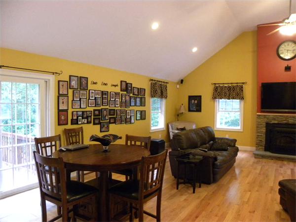 12 Lincoln Point Road Charlton, MA 01507 - Photo 12 of 30 a dining room with a table and chairs