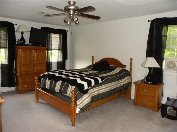 12 Lincoln Point Road Charlton, MA 01507 - Photo 14 of 30 a bedroom with a bed and window