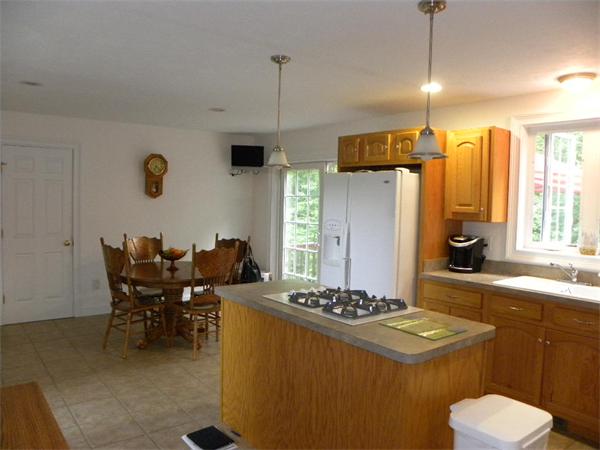12 Lincoln Point Road Charlton, MA 01507 - Photo 18 of 30 a kitchen with a table and chairs in it