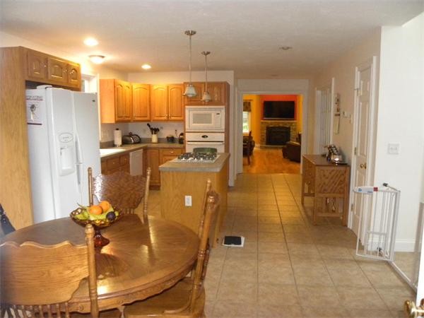 12 Lincoln Point Road Charlton, MA 01507 - Photo 20 of 30 a view of a kitchen with refrigerator and windows
