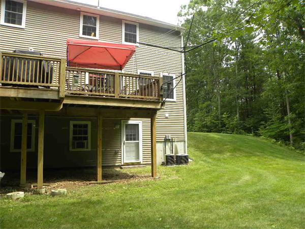 12 Lincoln Point Road Charlton, MA 01507 - Photo 2 of 30 a front view of a house with a yard