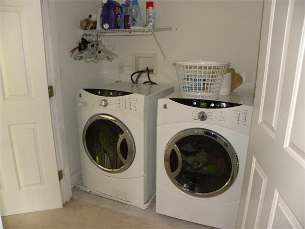 12 Lincoln Point Road Charlton, MA 01507 - Photo 25 of 30 a utility room with dryer and washer