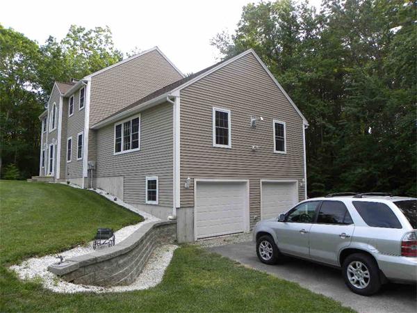 12 Lincoln Point Road Charlton, MA 01507 - Photo 5 of 30 a view of a house with a yard