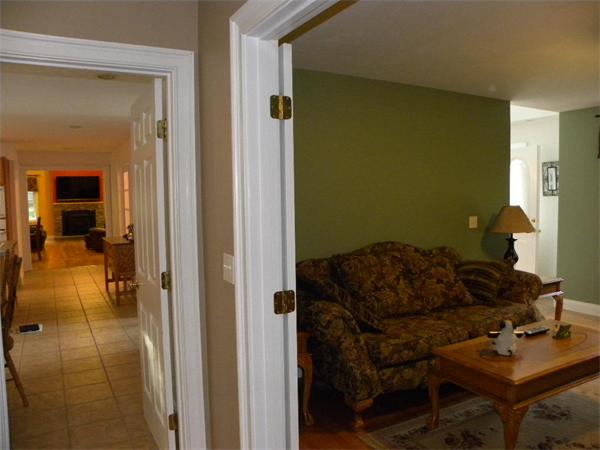 12 Lincoln Point Road Charlton, MA 01507 - Photo 9 of 30 a living room with furniture and a gate