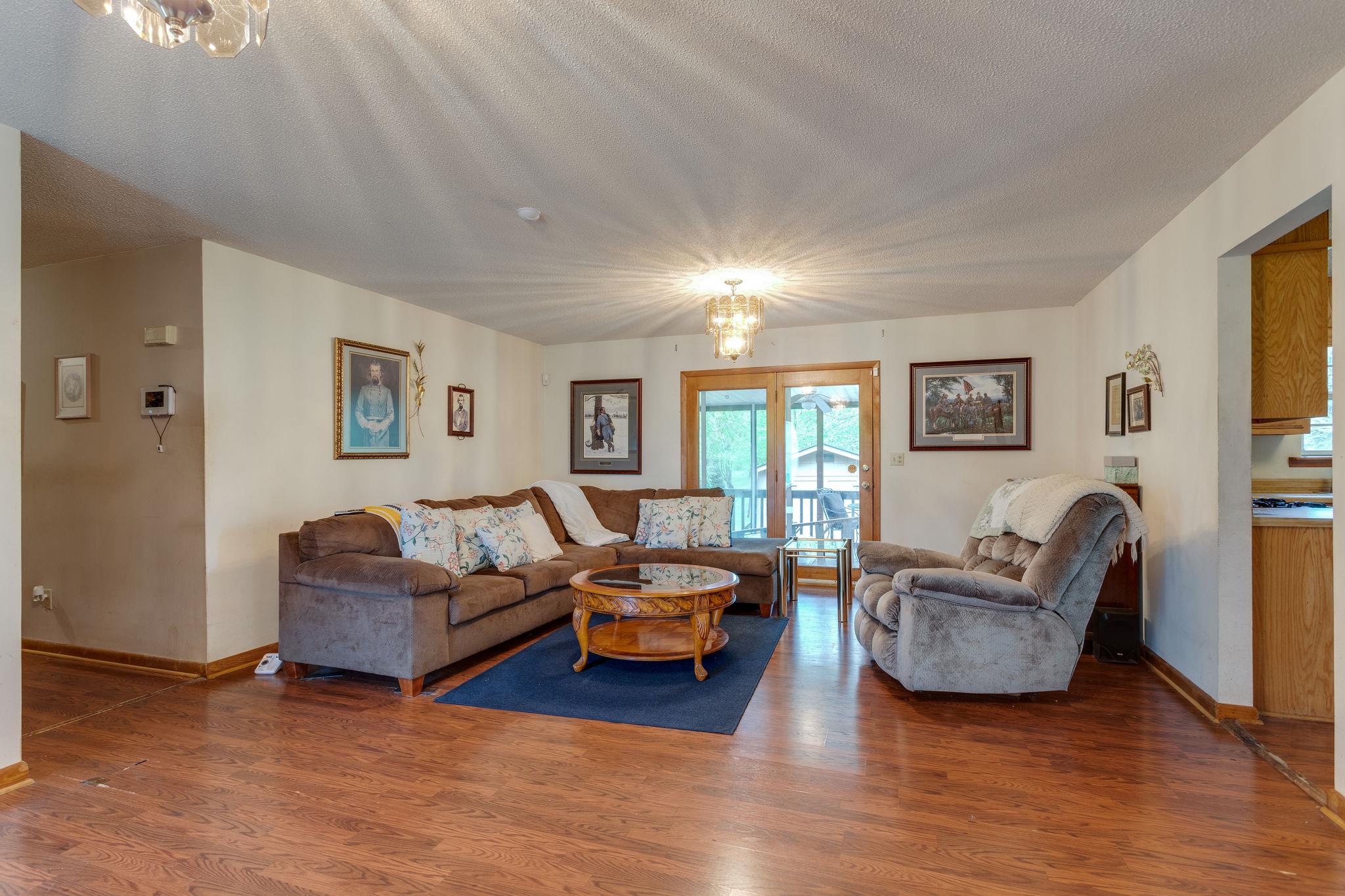 402 Canaan Road Columbia, TN 38401 - Photo 3 of 16 Spacious Living Room with Access to Back Screened Deck.