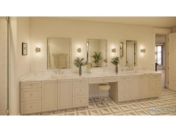 a bathroom with a sink mirror and a chair