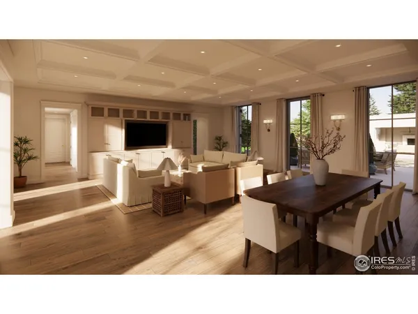 a living room with furniture a flat screen tv and a large window