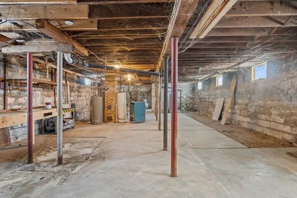 a view of a room with wooden door