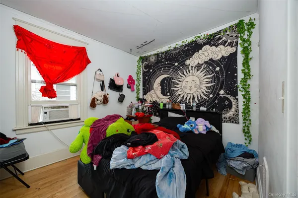 a room with toys and a flower pot