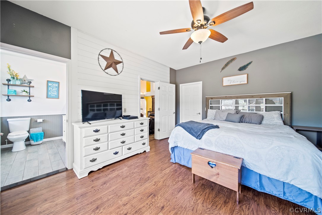 12700 Coalboro Road Chesterfield, VA 23838 - Photo 15 of 50 a bedroom with furniture and a flat screen tv