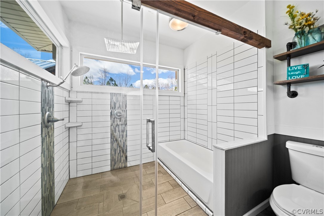 12700 Coalboro Road Chesterfield, VA 23838 - Photo 18 of 50 a bathroom with a toilet and shower