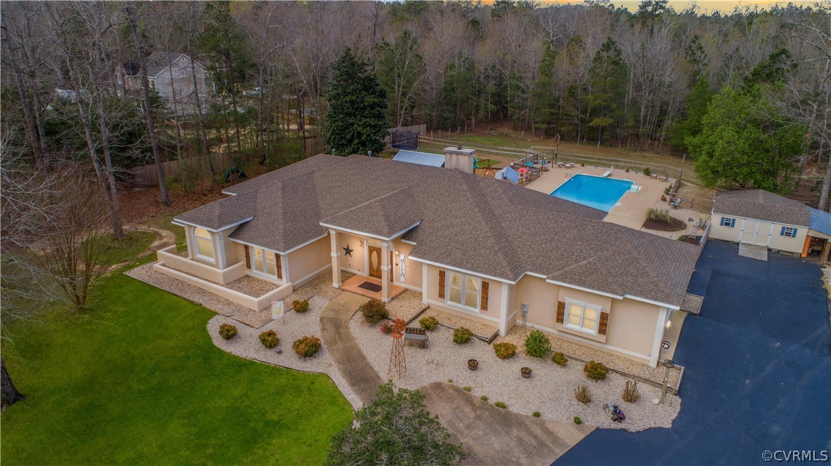 12700 Coalboro Road Chesterfield, VA 23838 - Photo 2 of 50 an aerial view of a house with pool garden and furniture