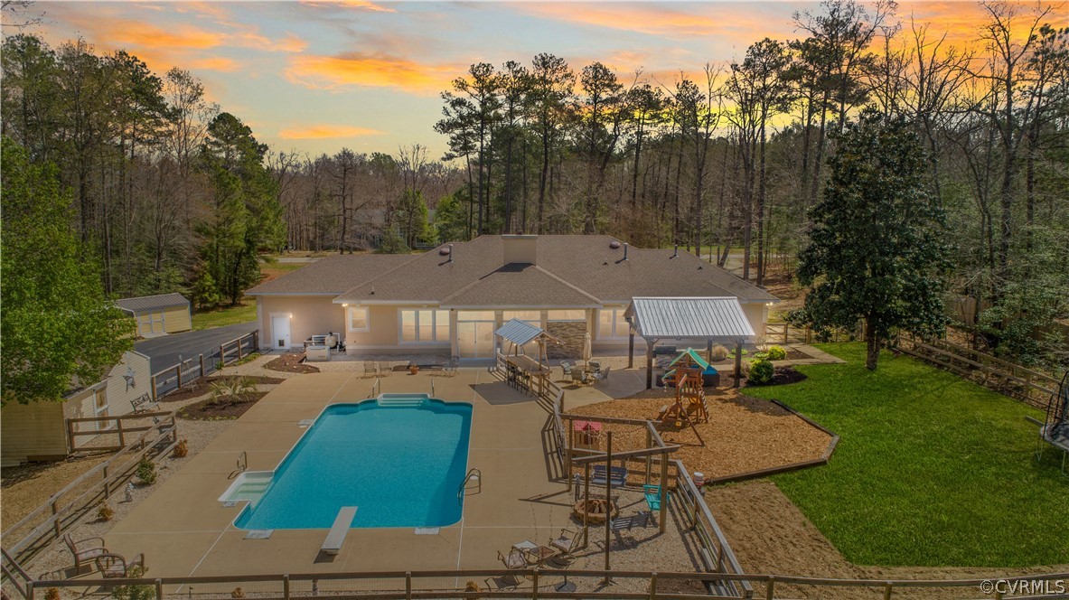 12700 Coalboro Road Chesterfield, VA 23838 - Photo 3 of 50 an aerial view of a house with garden space and a patio