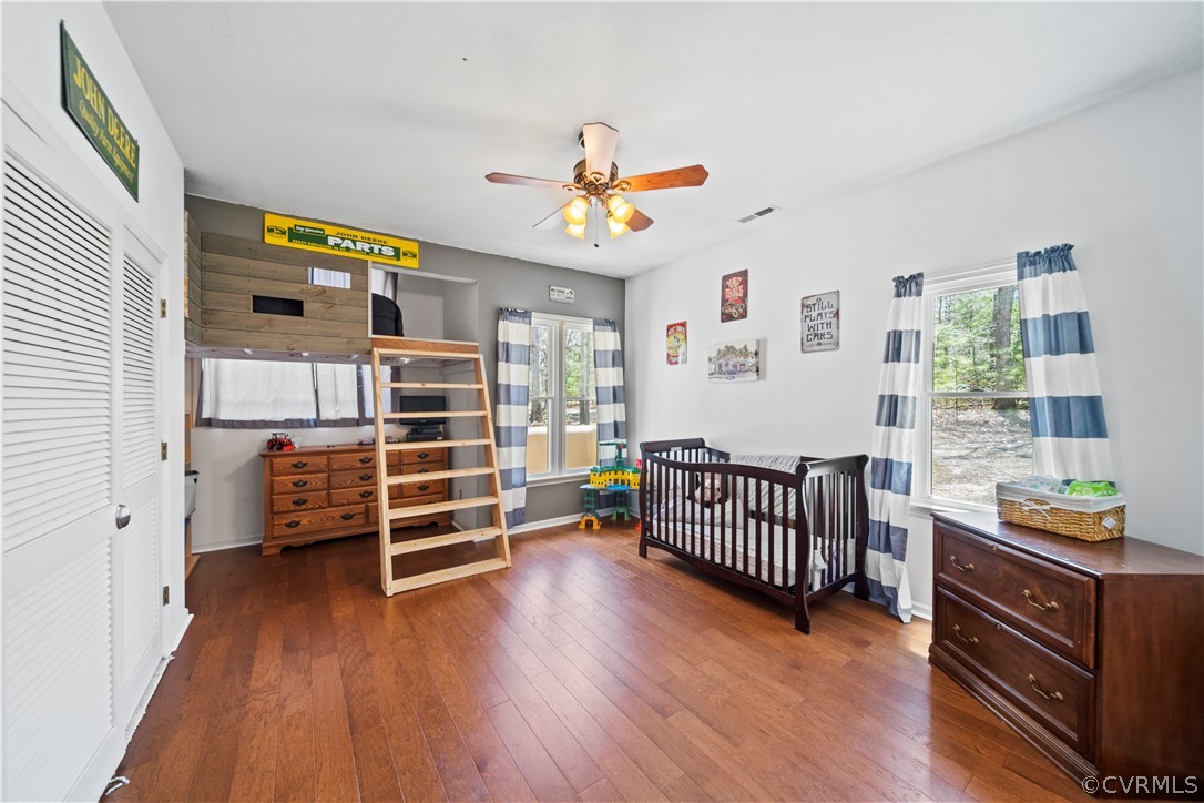 12700 Coalboro Road Chesterfield, VA 23838 - Photo 33 of 50 an empty room with furniture and wooden floor