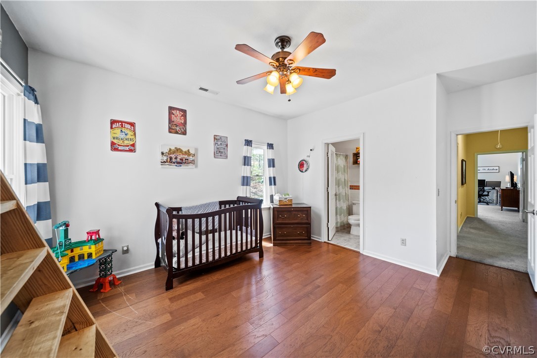 12700 Coalboro Road Chesterfield, VA 23838 - Photo 34 of 50 a view of an empty room with a window and wooden floor