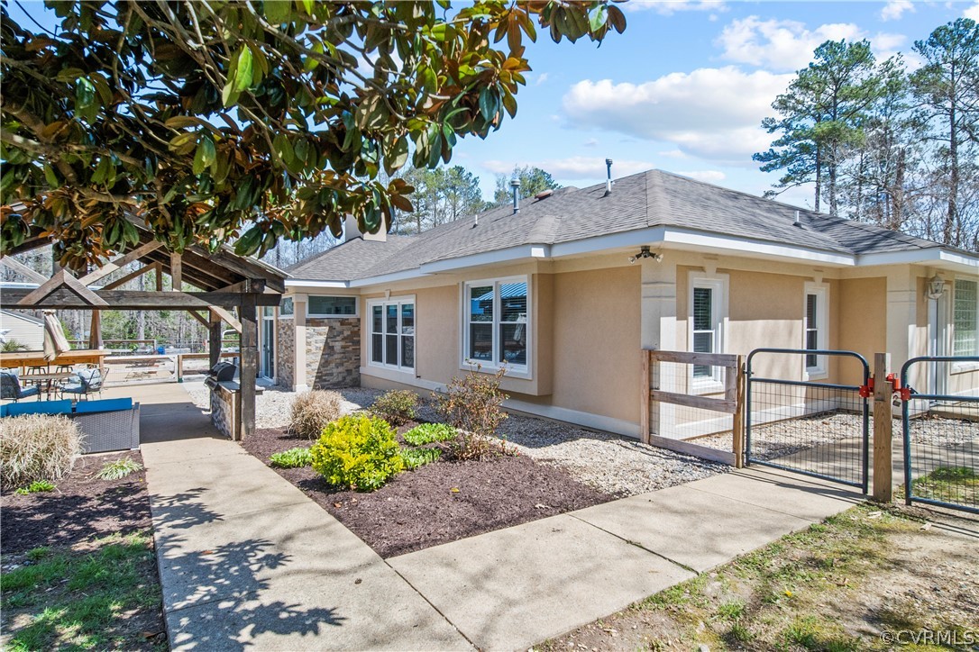 12700 Coalboro Road Chesterfield, VA 23838 - Photo 36 of 50 a front view of a house with garden