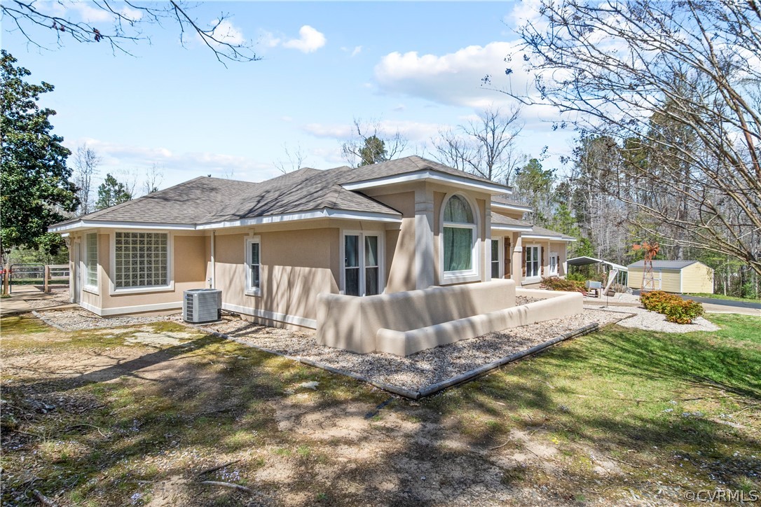 12700 Coalboro Road Chesterfield, VA 23838 - Photo 37 of 50 a view of a house with backyard porch and sitting area