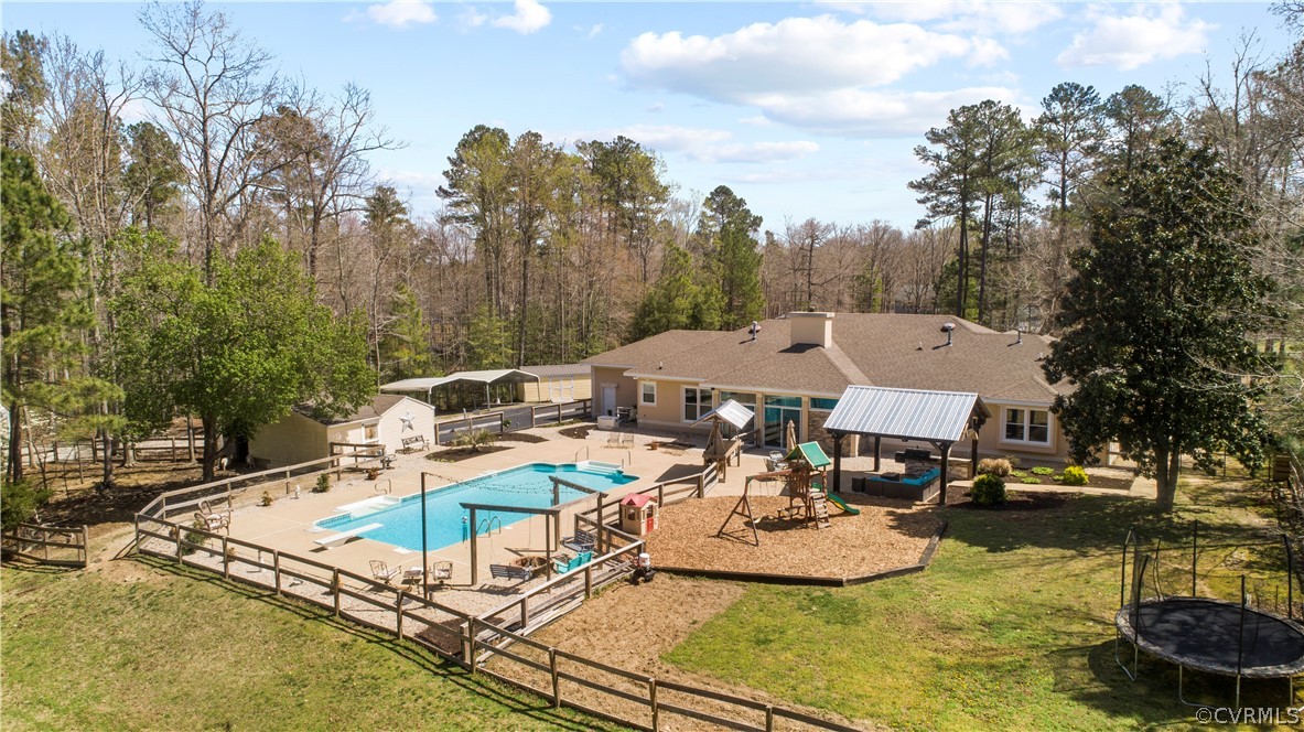 12700 Coalboro Road Chesterfield, VA 23838 - Photo 38 of 50 a view of a house with pool and chairs