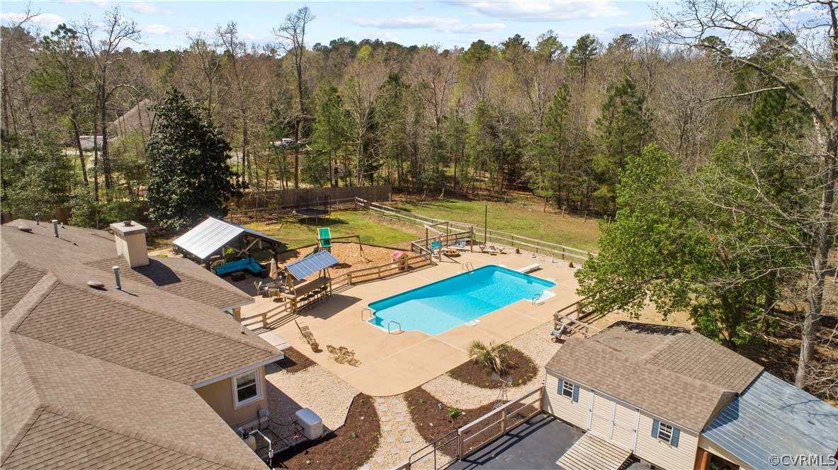 12700 Coalboro Road Chesterfield, VA 23838 - Photo 39 of 50 an aerial view of a house with a swimming pool
