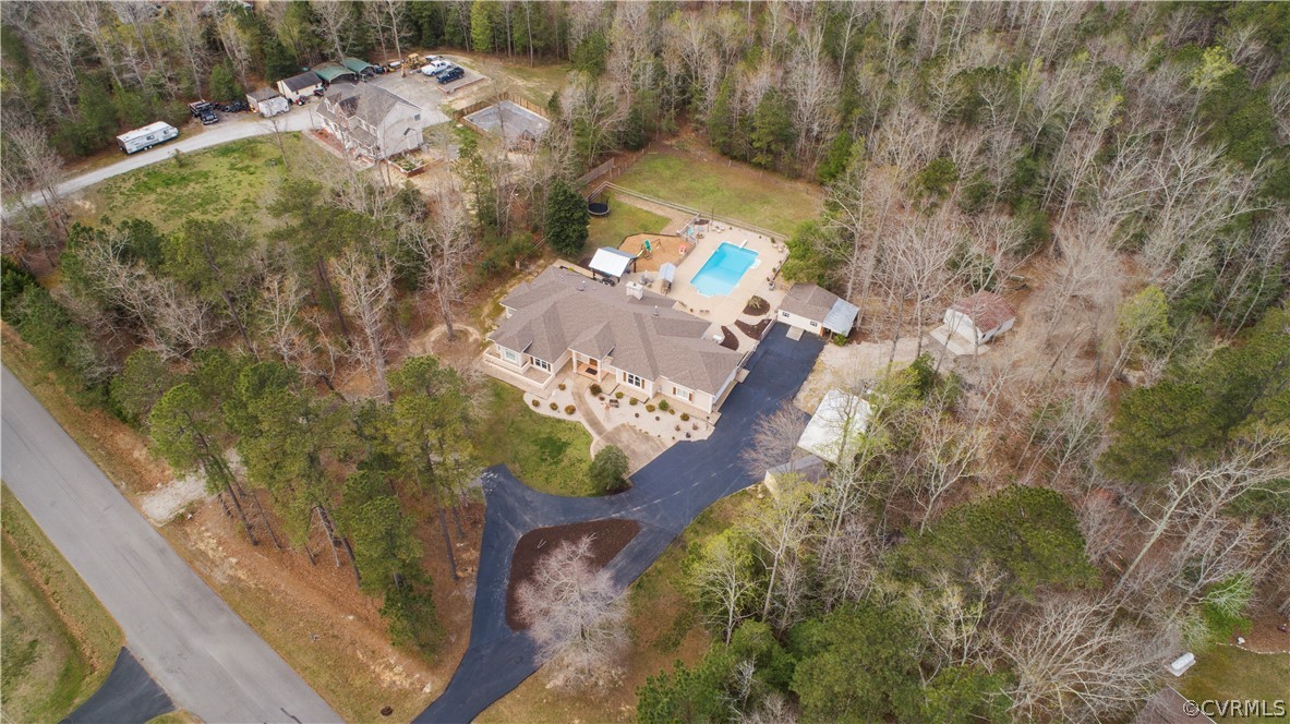 12700 Coalboro Road Chesterfield, VA 23838 - Photo 4 of 50 a aerial view of a house with a yard basket ball court