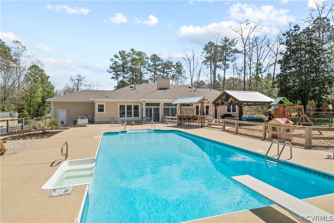 12700 Coalboro Road Chesterfield, VA 23838 - Photo 42 of 50 a front view of house with yard and swimming pool