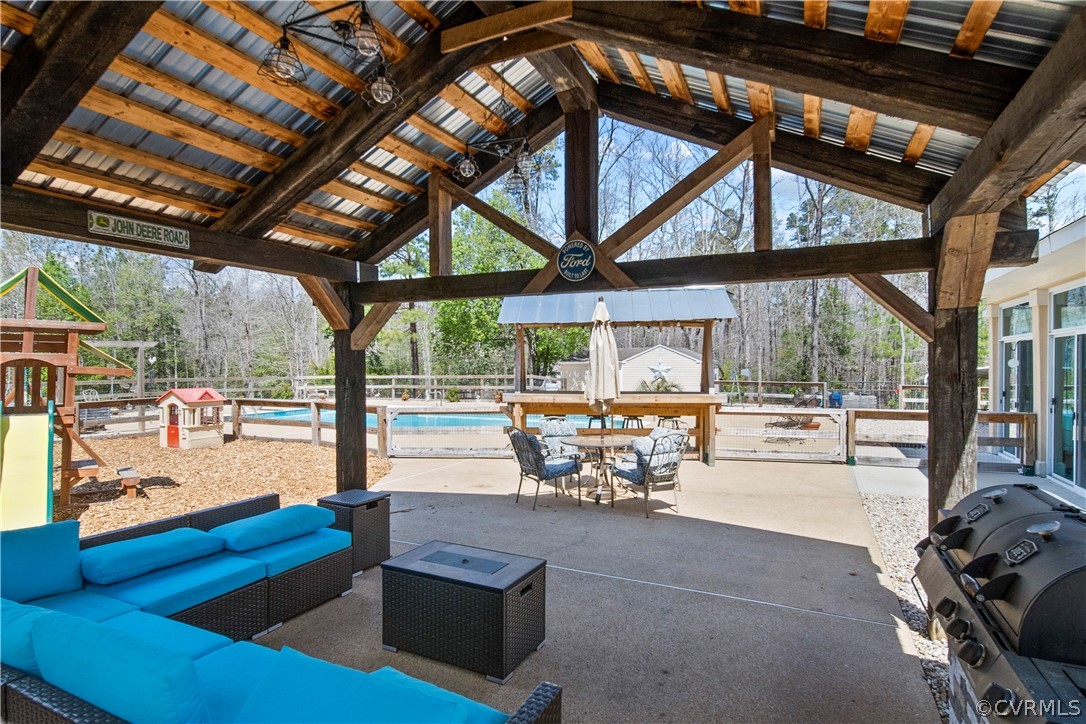 12700 Coalboro Road Chesterfield, VA 23838 - Photo 45 of 50 a swimming pool with outdoor seating