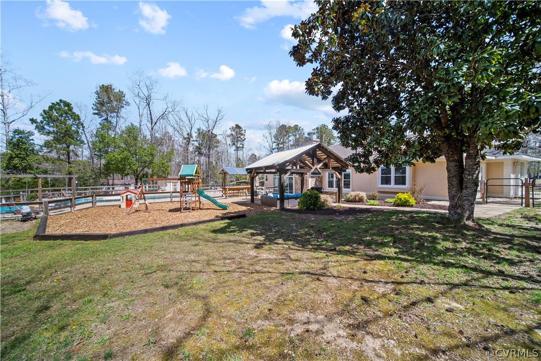 12700 Coalboro Road Chesterfield, VA 23838 - Photo 46 of 50 a view of a house with swimming pool and sitting area