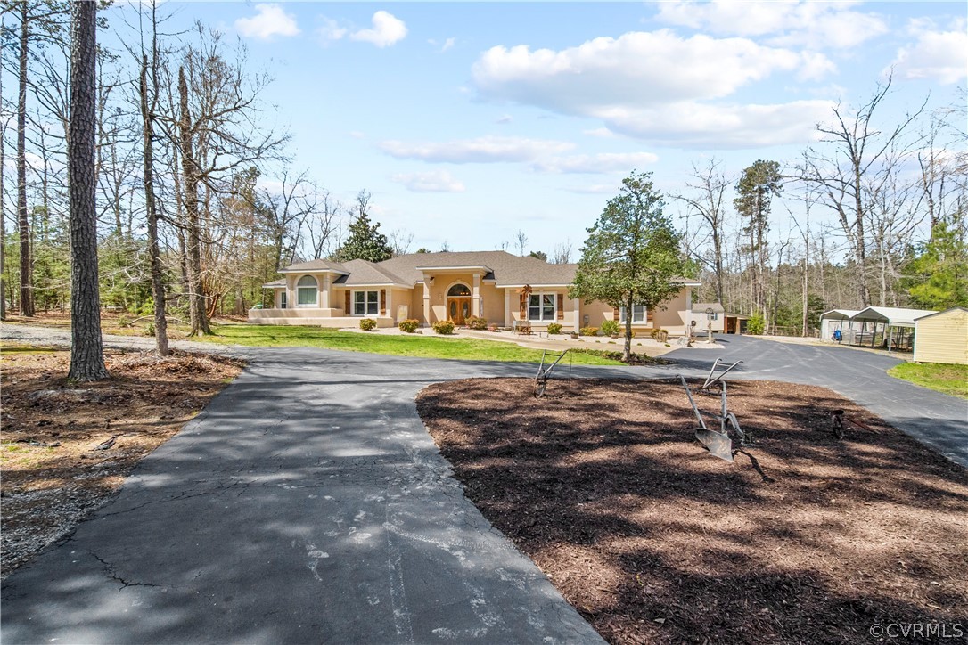12700 Coalboro Road Chesterfield, VA 23838 - Photo 50 of 50 a front view of a building with trees and buildings