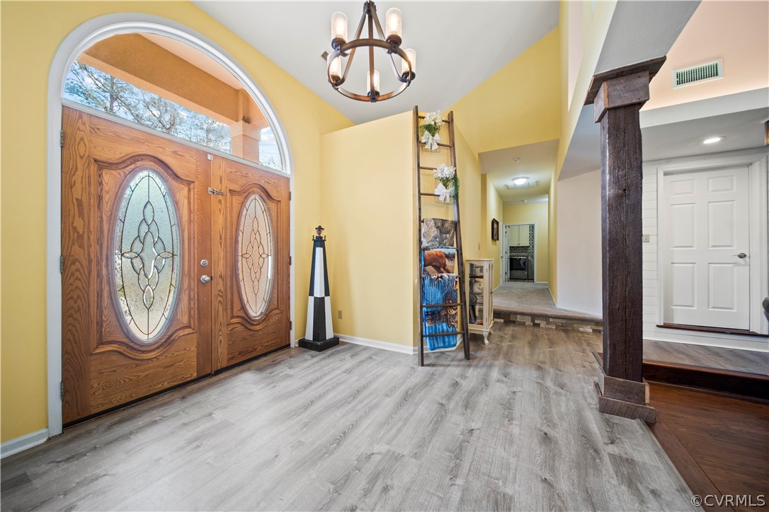 12700 Coalboro Road Chesterfield, VA 23838 - Photo 7 of 50 a view of a livingroom with wooden floor and door