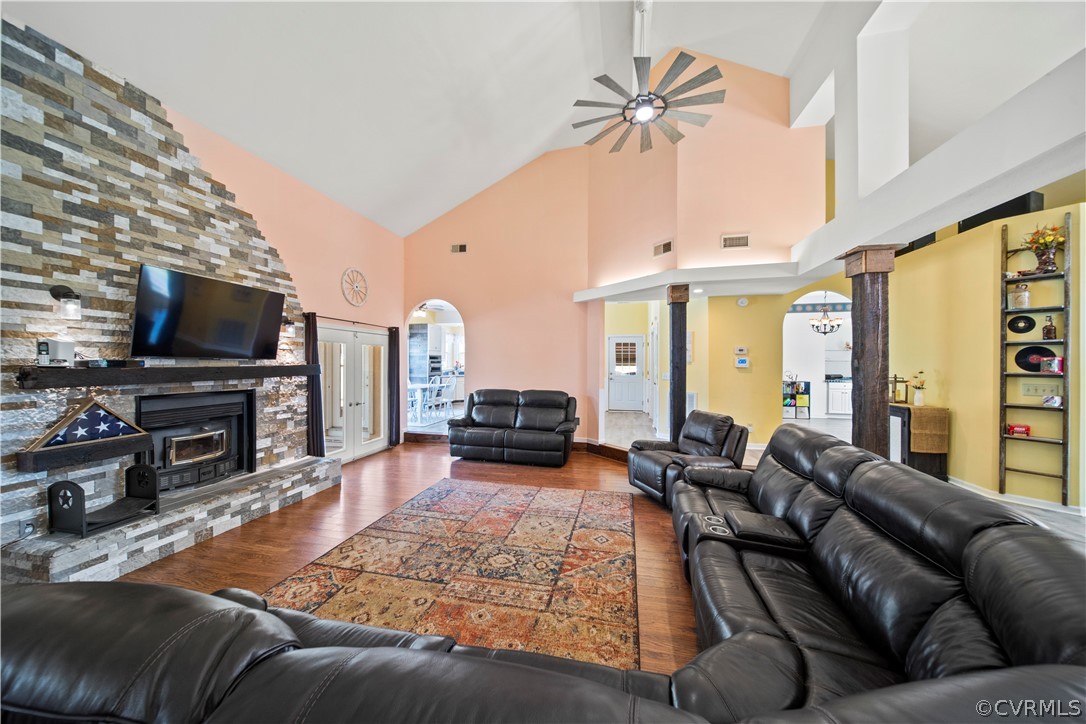 12700 Coalboro Road Chesterfield, VA 23838 - Photo 10 of 50 a living room with furniture a flat screen tv and a fireplace