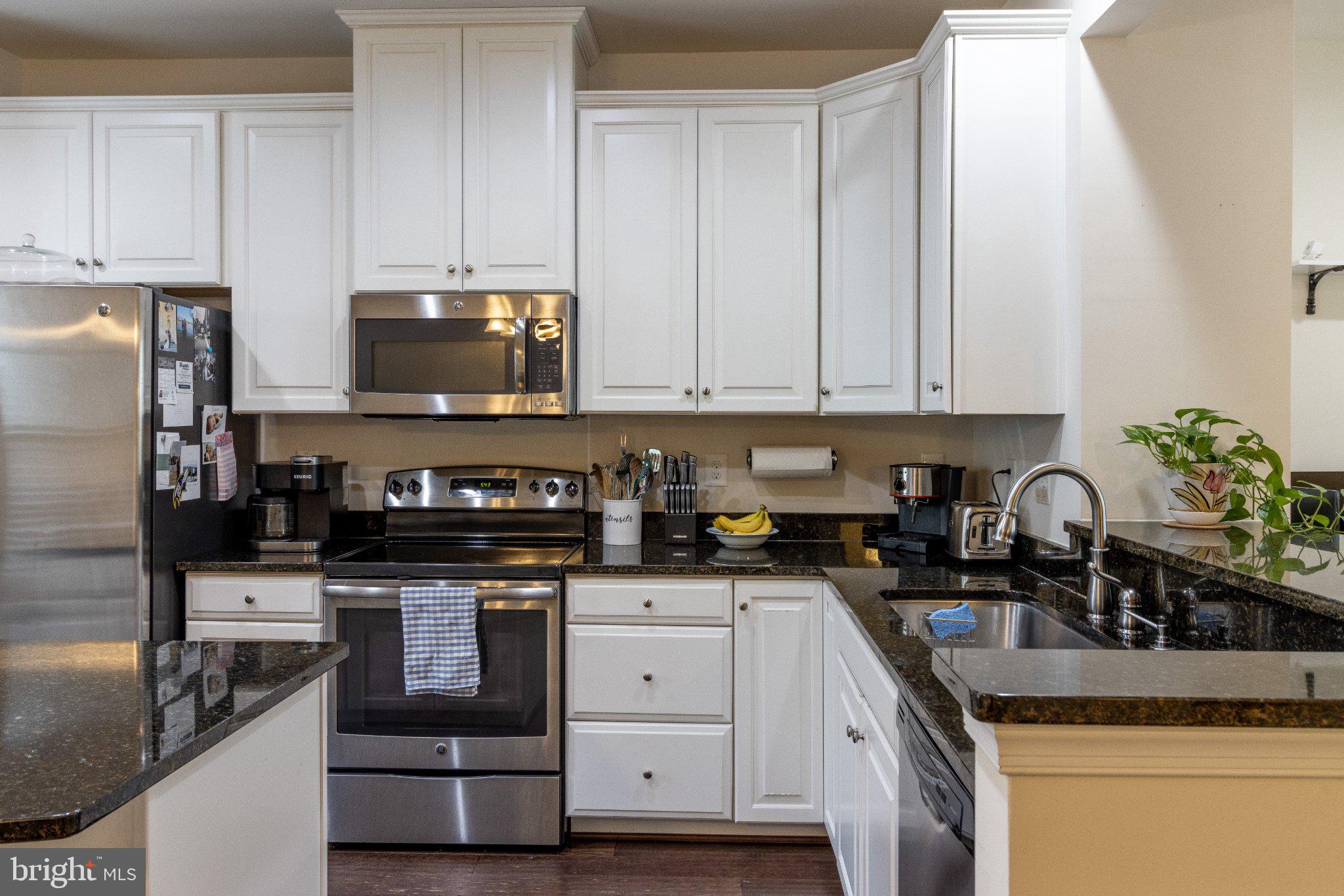 4658 Hudson Street Baltimore, MD 21224 - Photo 11 of 35 Modern kitchen with sleek finishes.