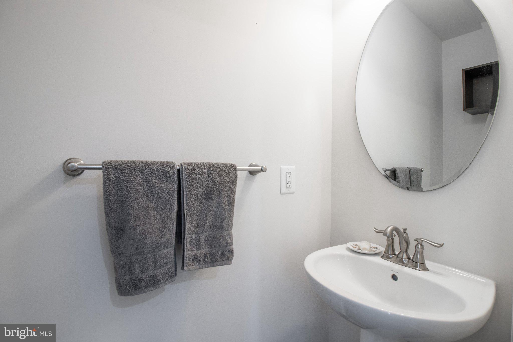 4658 Hudson Street Baltimore, MD 21224 - Photo 19 of 35 Sleek and modern bathroom elegance.