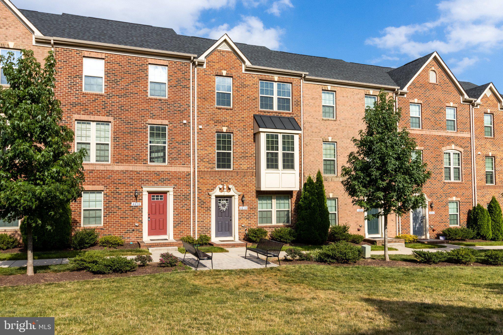 4658 Hudson Street Baltimore, MD 21224 - Photo 2 of 35 Charming brick townhomes in sunlight.