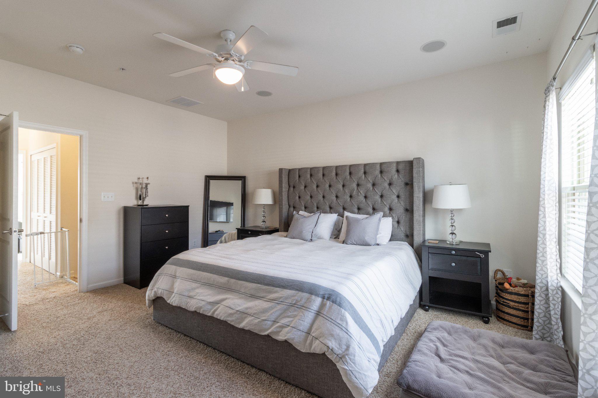 4658 Hudson Street Baltimore, MD 21224 - Photo 26 of 35 Serene bedroom with modern elegance.