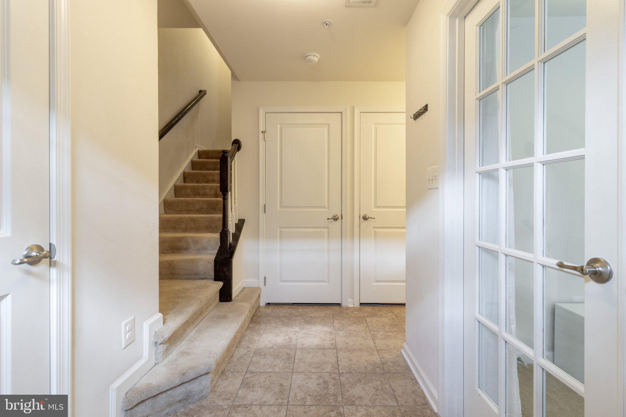 4658 Hudson Street Baltimore, MD 21224 - Photo 3 of 35 Inviting entryway with staircase charm.