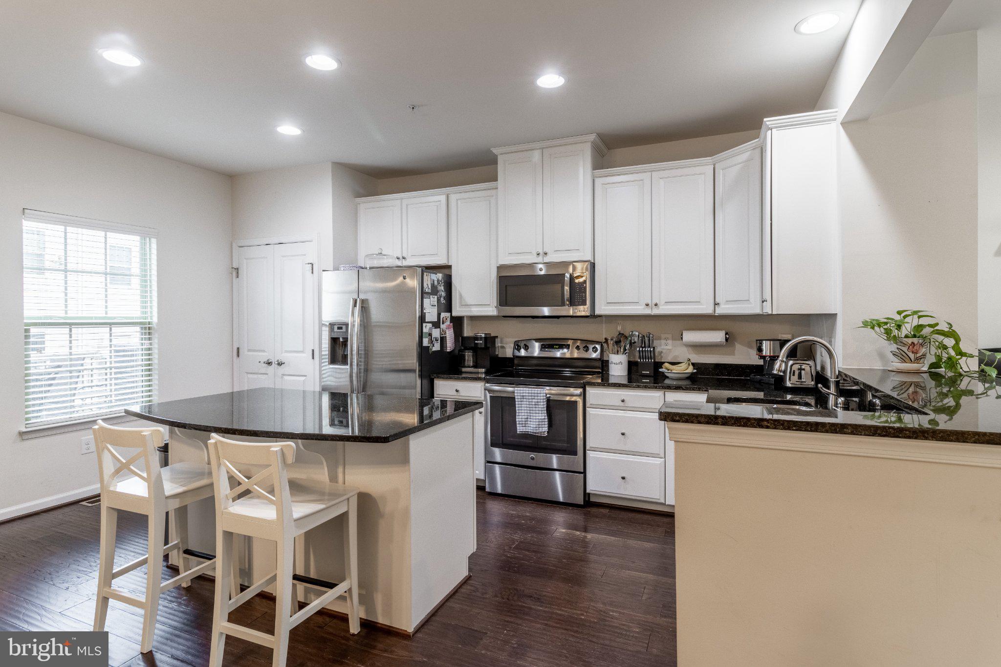 4658 Hudson Street Baltimore, MD 21224 - Photo 9 of 35 Modern kitchen with sleek finishes.