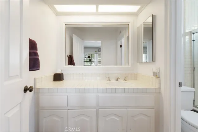 a view of a patio with a table and chairs