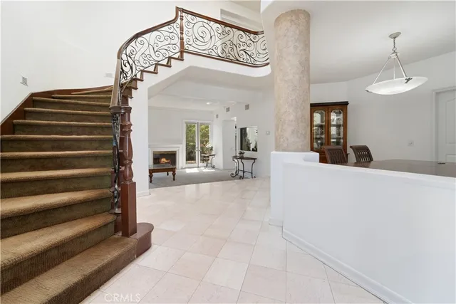 a view of a hallway view with staircase