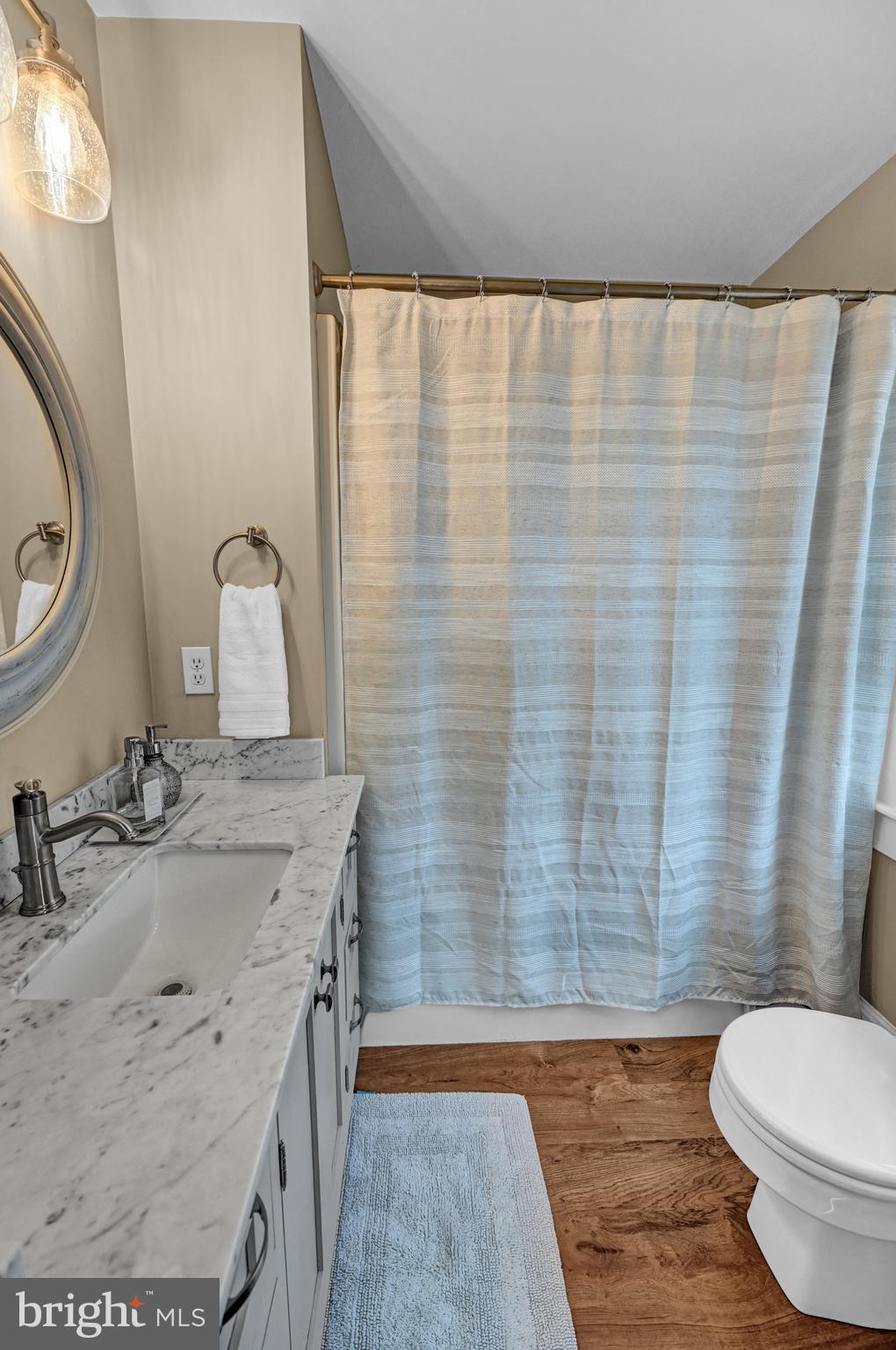 4207 Beckleysville Road Hampstead, MD 21074 - Photo 45 of 68 a bathroom with a sink toilet and shower