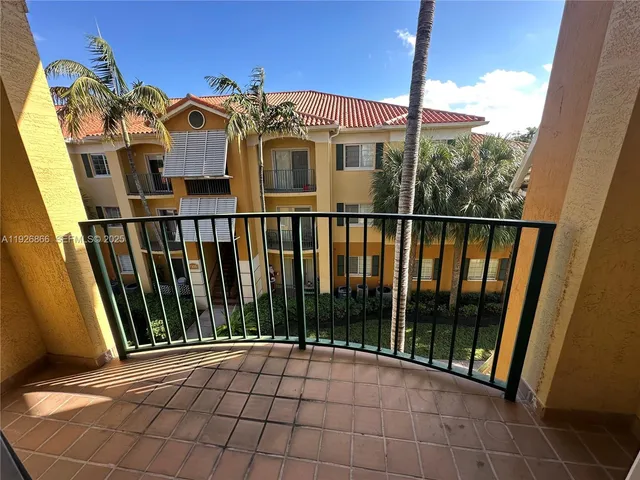 a view of a balcony with door