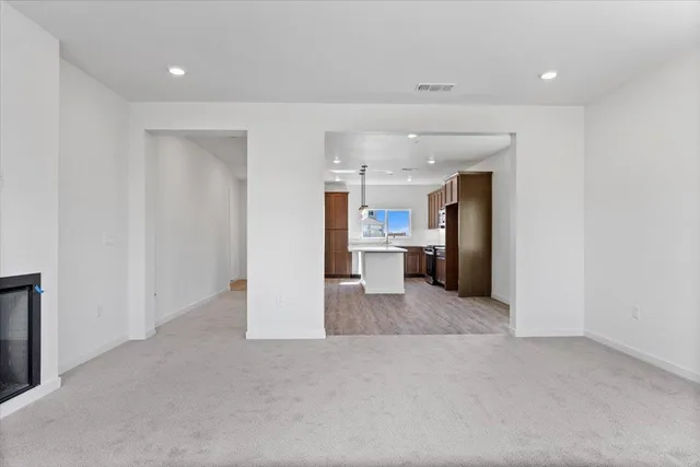 a view interior of kitchen and refrigerator