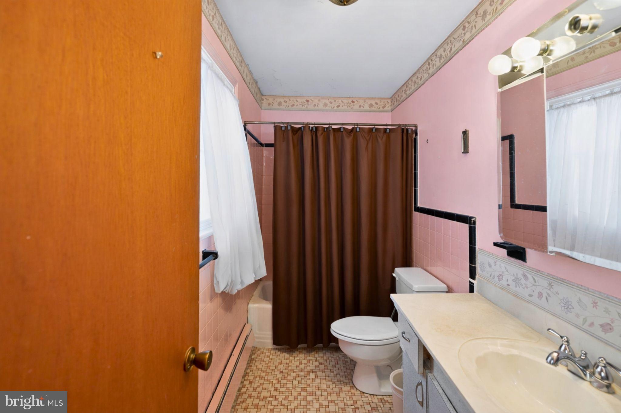 10509 North Keys Road Brandywine, MD 20613 - Photo 16 of 30 a bathroom with a sink and toilet