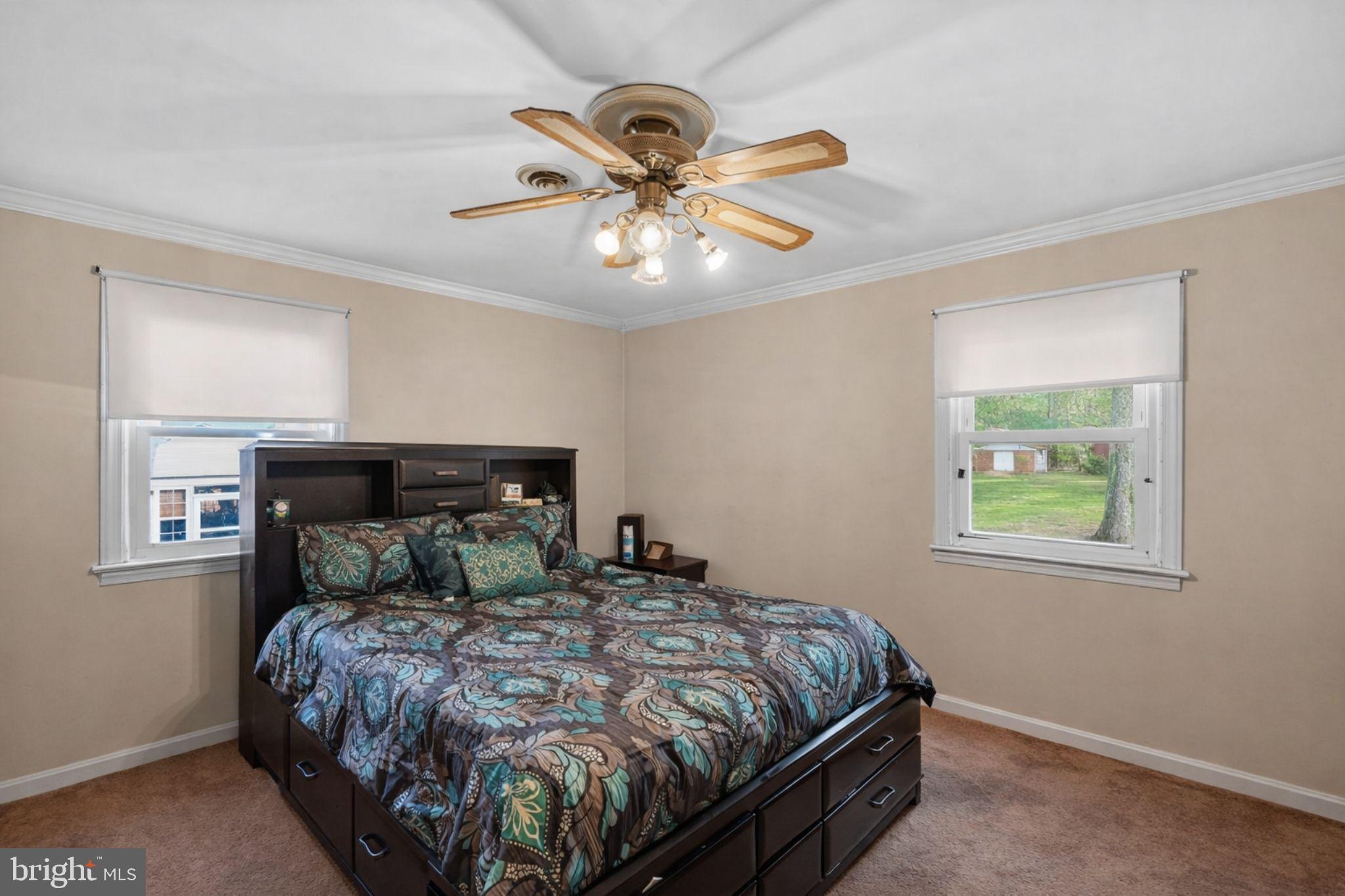 10509 North Keys Road Brandywine, MD 20613 - Photo 17 of 30 a bedroom with a bed and window