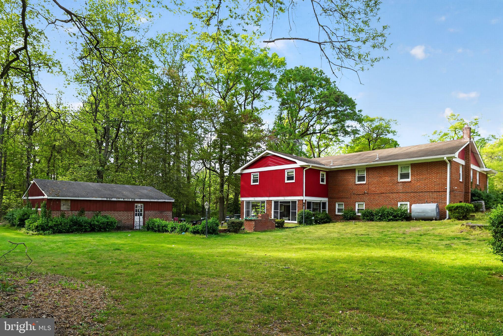 10509 North Keys Road Brandywine, MD 20613 - Photo 26 of 30 a view of a house with a yard