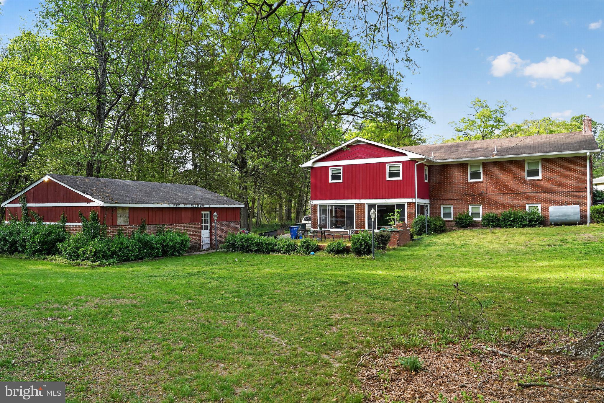 10509 North Keys Road Brandywine, MD 20613 - Photo 27 of 30 a view of a yard in front of a house with large tree