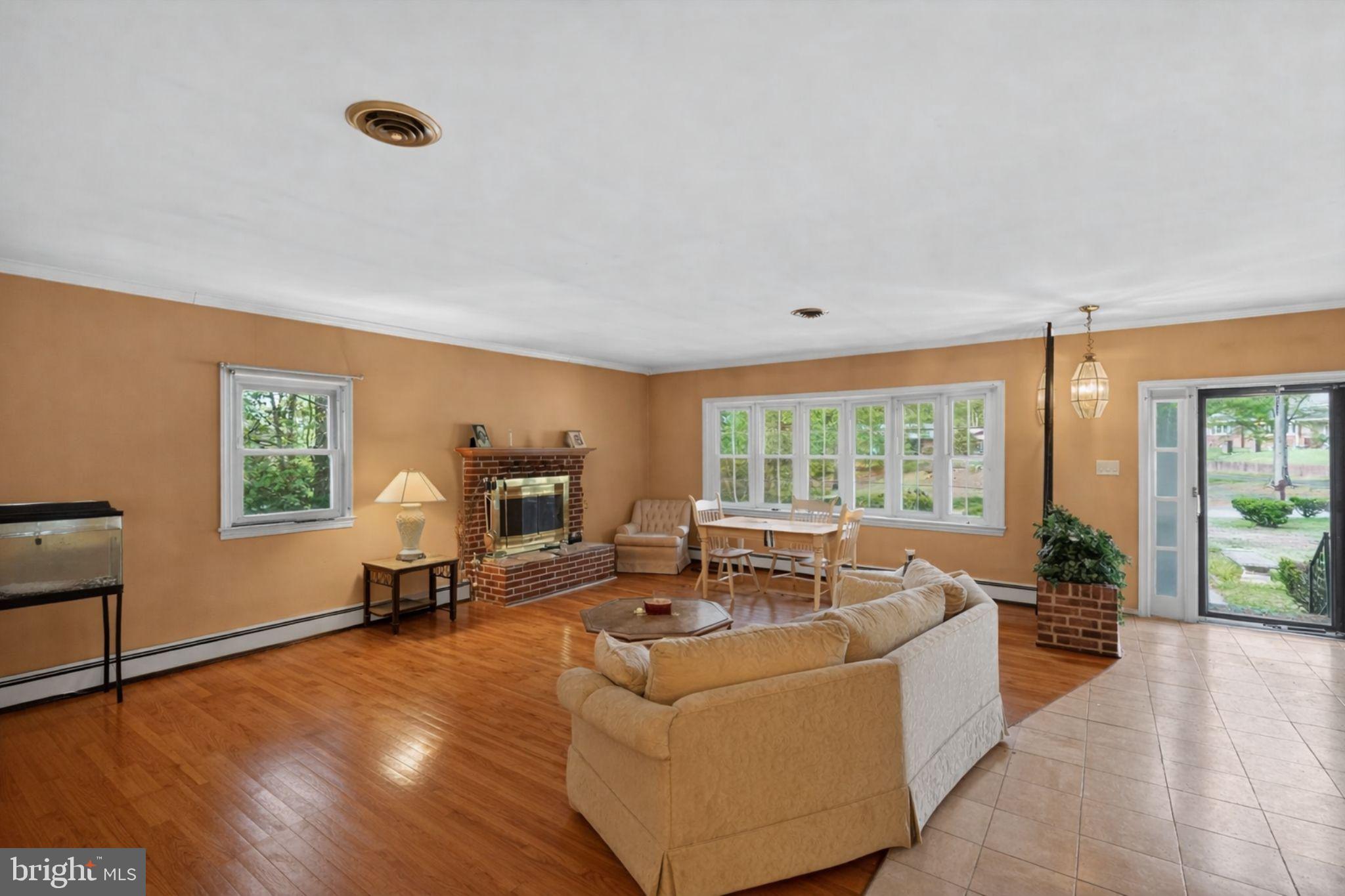 10509 North Keys Road Brandywine, MD 20613 - Photo 3 of 30 a living room with furniture and large windows
